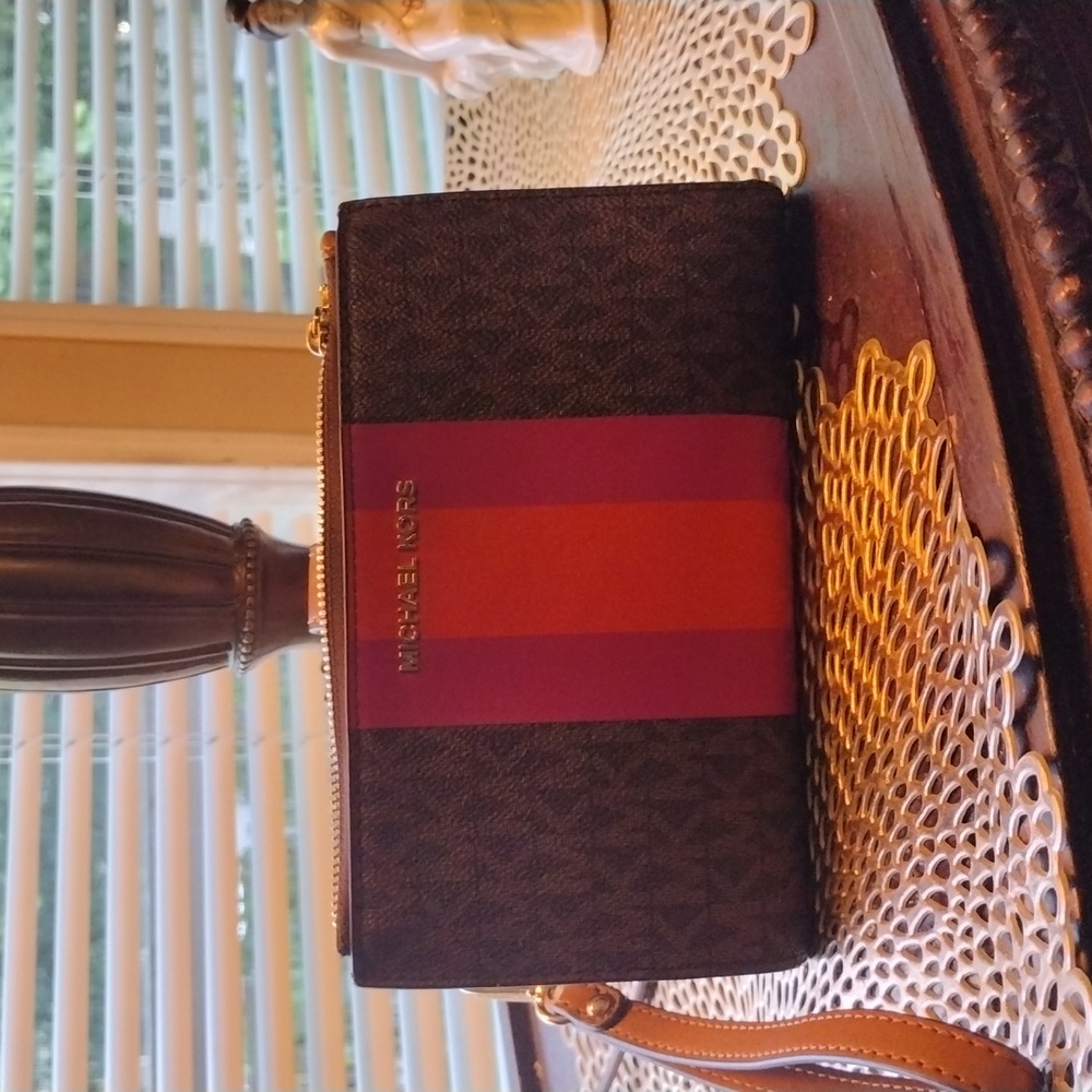 Michael kors Cell phone wallet. SOLD SOLD SOLD